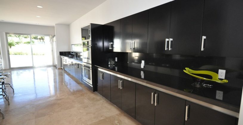Lovely Black Metal Kitchen Cabinets Bewitching Casa China Blanca With Also Curvy Plate In Yellow Color Orange Square Marble Floor And White Pounded Ceiling