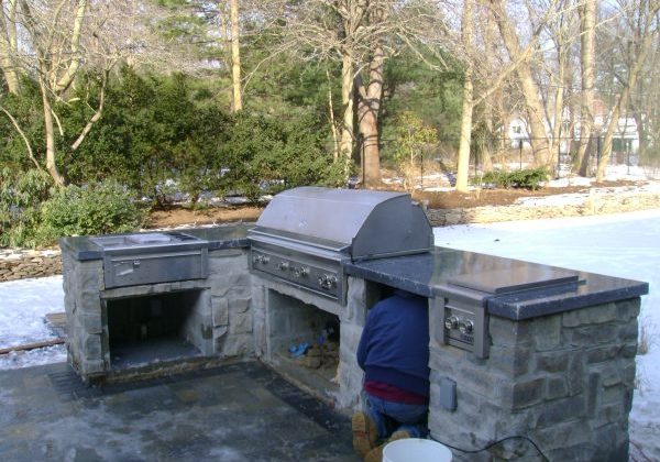 Lovely Pre Made Outdoor Kitchens Kitchen Appliances Entrancing Cabinets With Stainless Steel Double Sink And Soap Stone Countertops On Veneer Island 600x450
